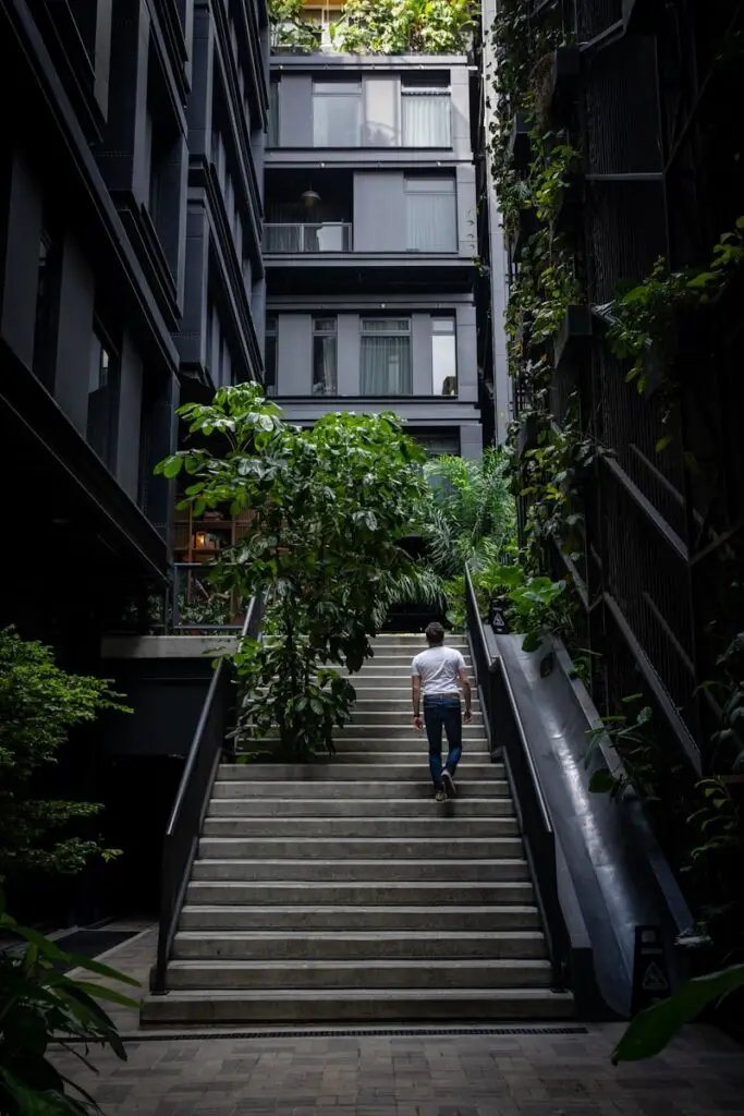 a man walking down a flight of stairs